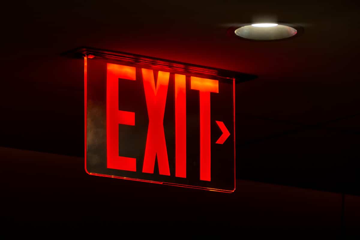 a lit emergency exit sign